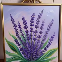 a painting of purple flowers on a canvas in front of a white wall
