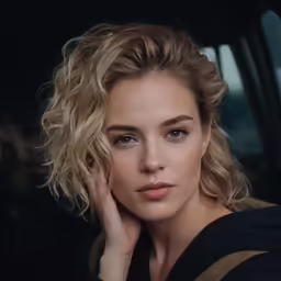 a close up of a person with a car door open