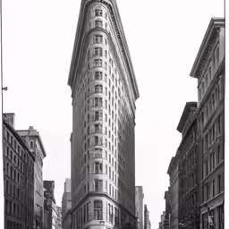 black and white photograph of flat stone buildings in new york