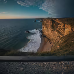 a scenic view with cliffs in the distance