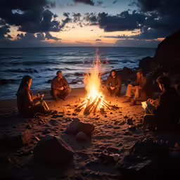 several people sit around a campfire while the sun is setting