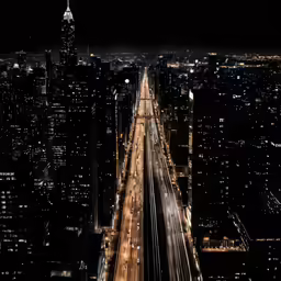 view of a city street with cars on it