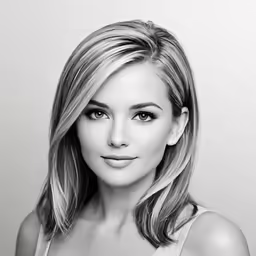 a woman in white is posing for a black and white photo