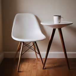 two chairs side by side in the corner of a room