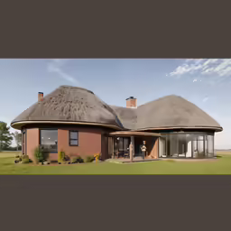 the big building has thatched roof and windows