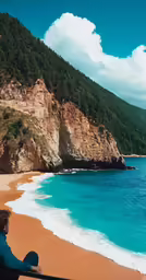 a woman standing on the side of a beach next to the ocean