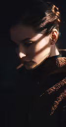 the lady has dark hair and is wearing her earring