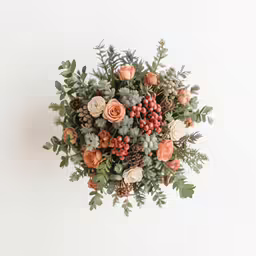 bouquet of orange and white flowers against white background