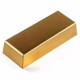 a small gold colored object on a white surface