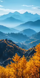 mountains and trees with yellow leaves