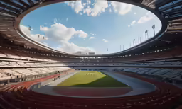 a group of people playing soccer inside a large stadium