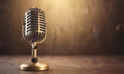 a close - up of an old - fashioned microphone on a table