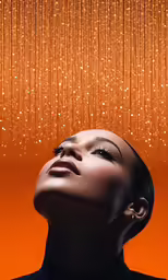 an abstract photo of a woman with her eyes closed and raindrops on her face