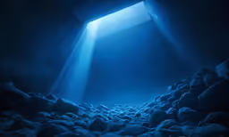 the sun beaming through a hole in the ocean floor