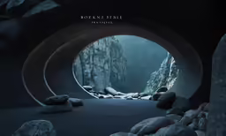 a tunnel entrance in the mountains with a curved walkway