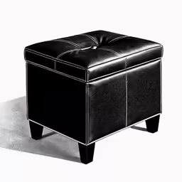 an image of a black ottoman sitting on the ground
