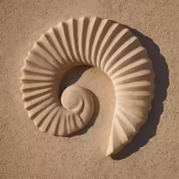 a sand sculpture sitting on top of a sandy beach