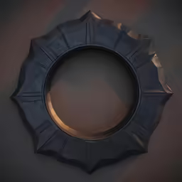 a black circular object hanging on a wall