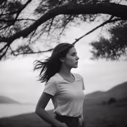 a woman with long hair posing for a photo