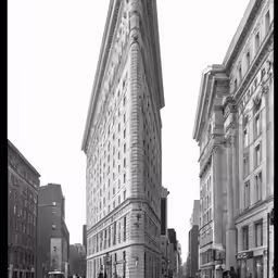 some old buildings and some people on the sidewalk
