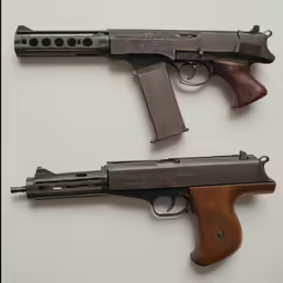 two colt pistols displayed on white table with black dots