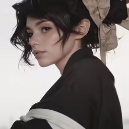 a woman in an asian clothing with her hair pulled back
