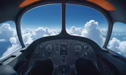 view from inside a cockpit looking out at the clouds