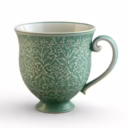 a coffee cup sitting in front of a white backdrop