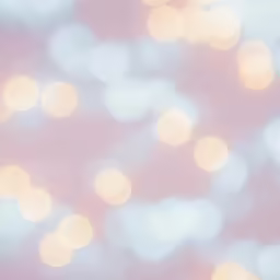 blurry image of pasted lights against a pink background