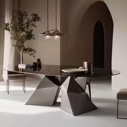 modern table designed with metallic geometrics and glass
