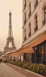 there is a very tall tower that can be seen from another building