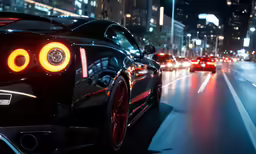 cars driving down a street next to tall buildings