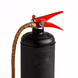 a red handled scissors and a black can are used to fire retardant