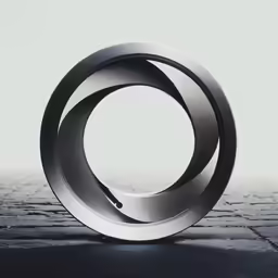a picture of a circular object sitting on a pavement