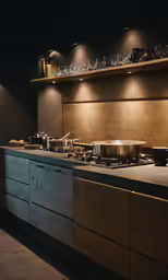 a modern style kitchen that has wooden counters
