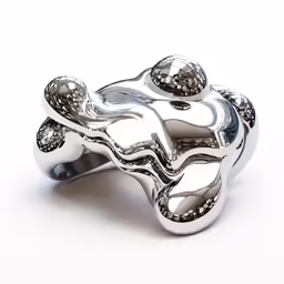 a sculpture of two balls on a silver plate