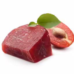 a piece of meat and a piece of fruit