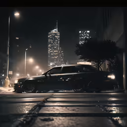 a taxi cab sits parked along the side of the road