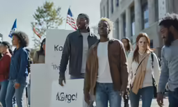 a group of young people walking down the street