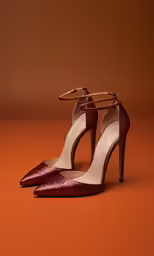 the shoe is on the orange surface