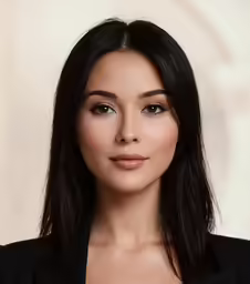 an image of an asian woman with a black jacket on
