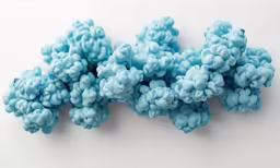 this is a bunch of blue plastic balls of yarn