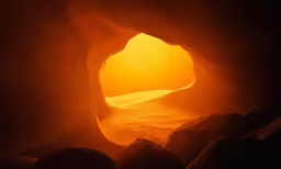 the sunlight is shining inside the cave