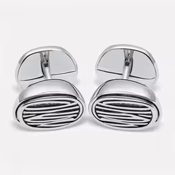 the cuff ends of a pair of silver cuff links