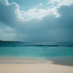 an ocean landscape with an overcast sky