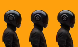 three mannes with helmets on their heads