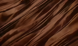 a brown, wrinkled fabric texture
