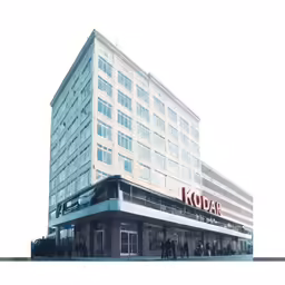 the outside of a kodak building in a city