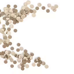 an array of different types of pills on white background