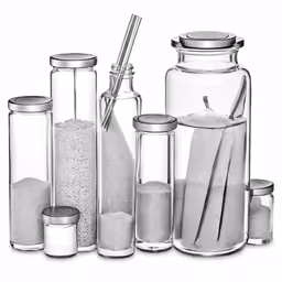 glass containers are stacked up with sand and spoons